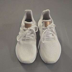 adidas White Athletic Shoes with Gold Accents